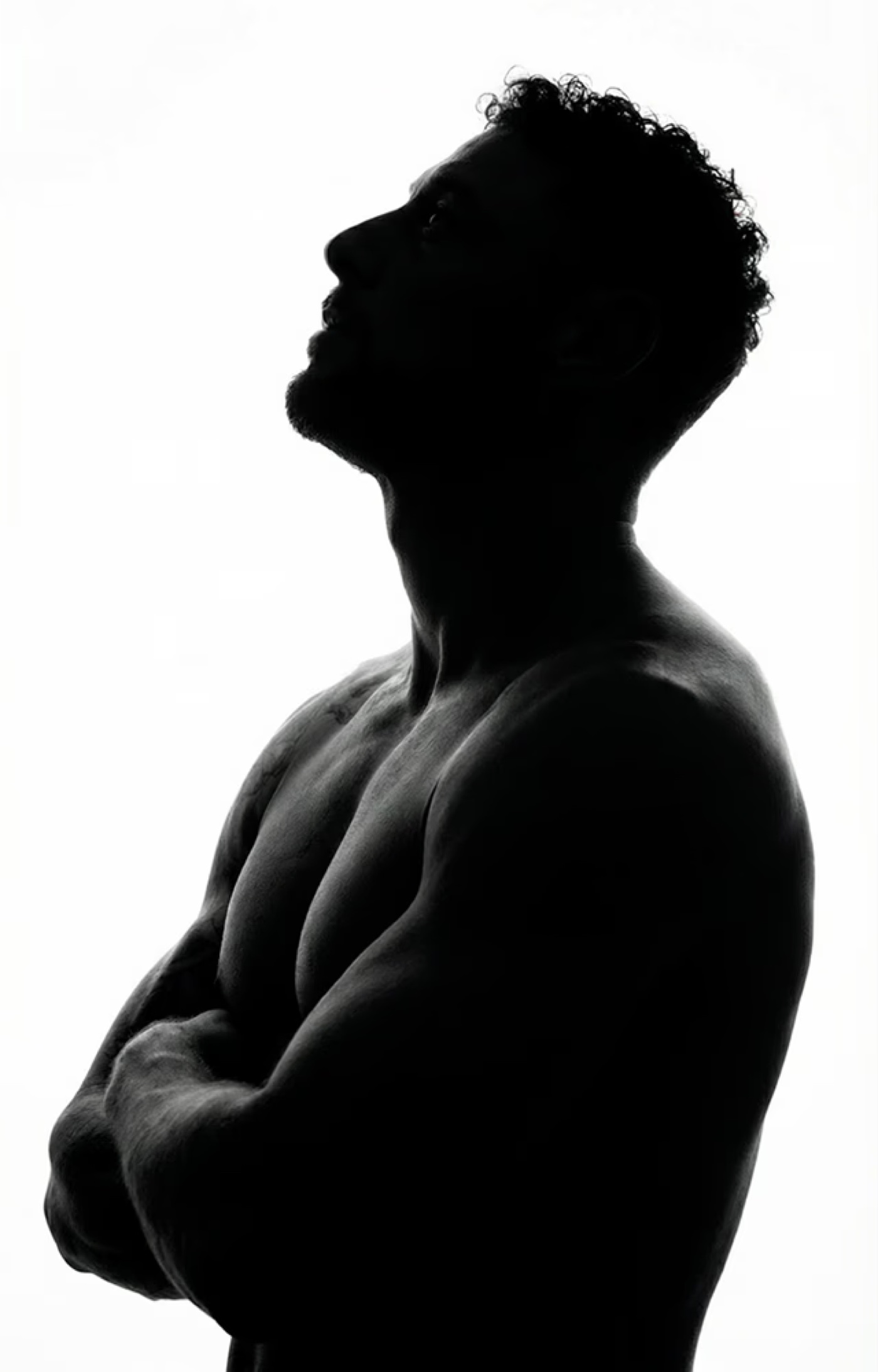 A silhouette with head tilted back